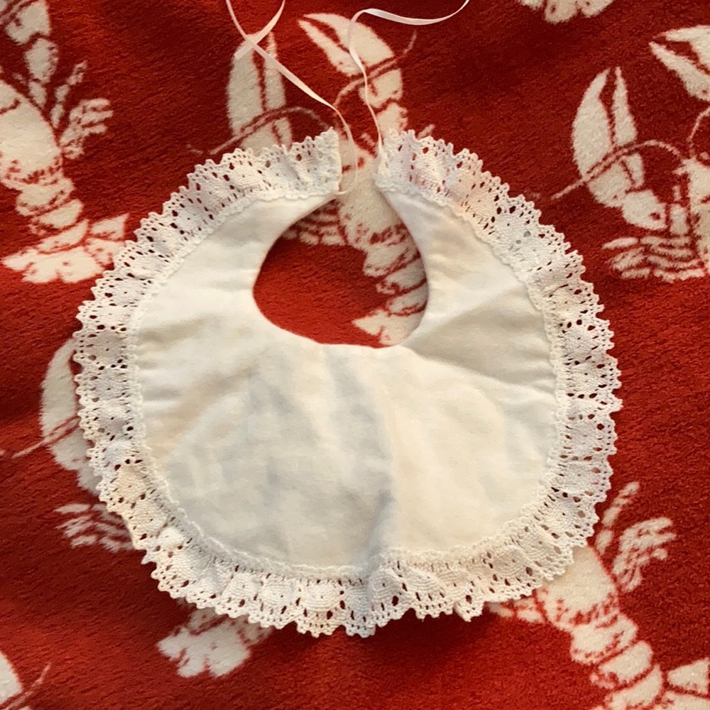 Lace trimmed baby bib NWOT